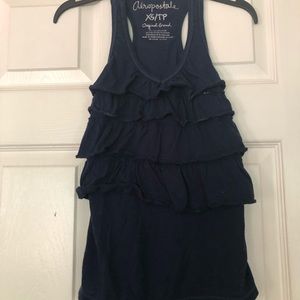 Navy blue ruffled tank top.